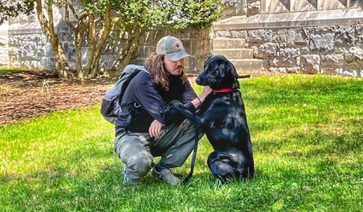 Puppy training Blacksburg VA trainer with black dog